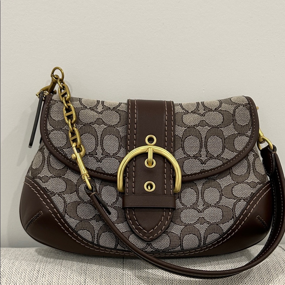 Coach Brown Signature Canvas Saddle Crossbody with Gold Buckle very clean !!